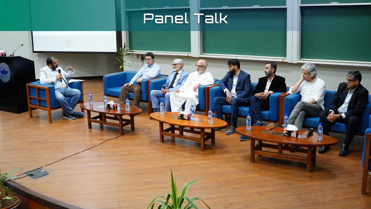 Panel talk with judges and past participants on stage at LUMS